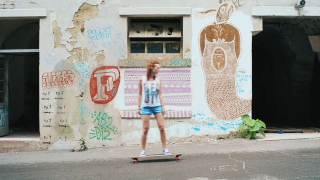 Video Reference: Text, Wall, Standing, Street art, Skateboard, Art, Tree, Architecture, Photography, Longboard