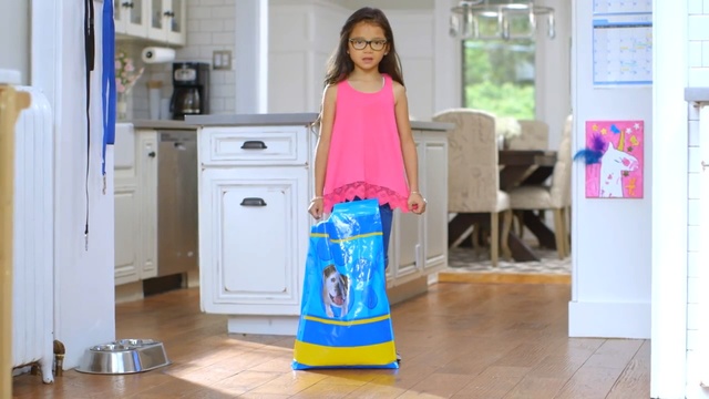 Video Reference: clothing, pink, shoulder, dress, outerwear, product, flooring, girl, fashion design, Person