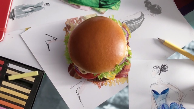 Video Reference: Food, Cheeseburger, Hamburger, Dish, Cuisine, Bun, Finger food, Junk food, Meal, Fast food, Person