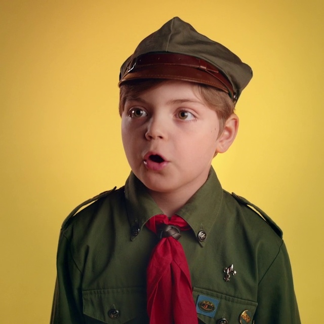 Video Reference: Military uniform, Uniform, Headgear, Cap, Side cap, Gesture, Portrait, Sleeve, Official, Military rank, Person, Wearing, Hat, Indoor, Clothing, Boy, Green, Jacket, Man, Young, Holding, Standing, Posing, Dressed, Baseball, Shirt, Suit, Smiling, Little, Hair, Yellow, Head, Computer, Red, White, Umbrella, Wall, Fashion accessory, Human face