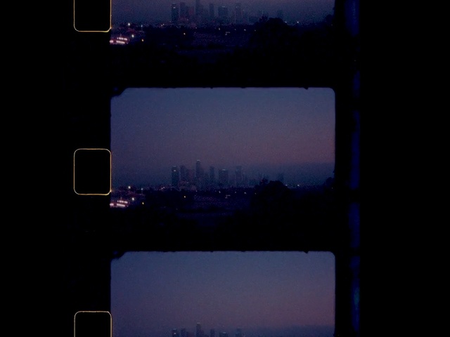 Video Reference: Sky, Blue, Purple, Night, Darkness, Technology, Room, Horizon, City, Photography, Monitor, Light, Laptop, Background, Computer, Screen, Keyboard, Sitting, Traffic, Dark, View, Table, Lit, Television, Close, Street, Phone, Bus, Stop, Desktop, White, Text, Skyscraper, Screenshot, Cloud, Image