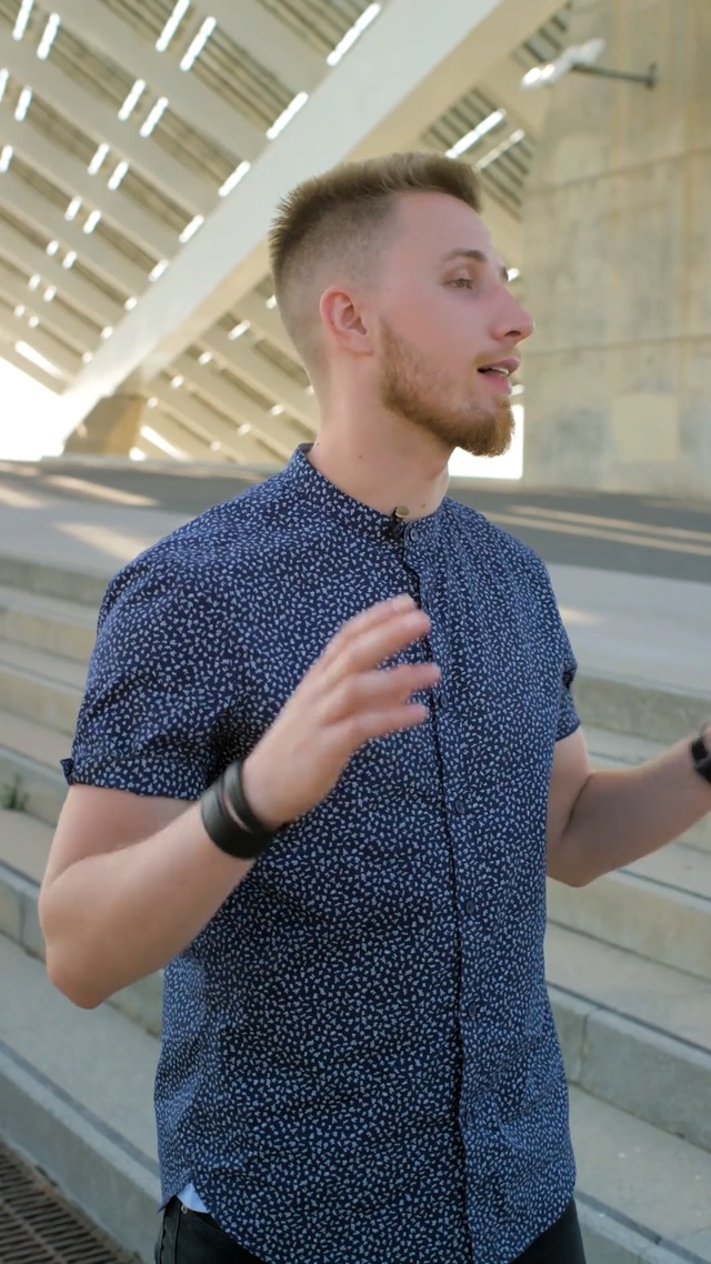 Video Reference: Blue, Shoulder, Neck, Arm, Outerwear, Joint, Denim, Top, Electric blue, Knitting, Person