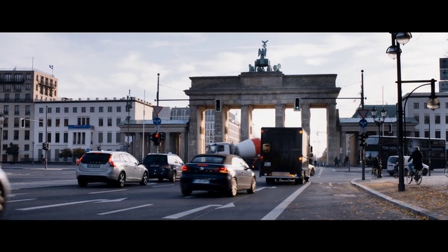 Video Reference: Town, Architecture, Urban area, Transport, City, Street, Human settlement, Sky, Neighbourhood, Mode of transport