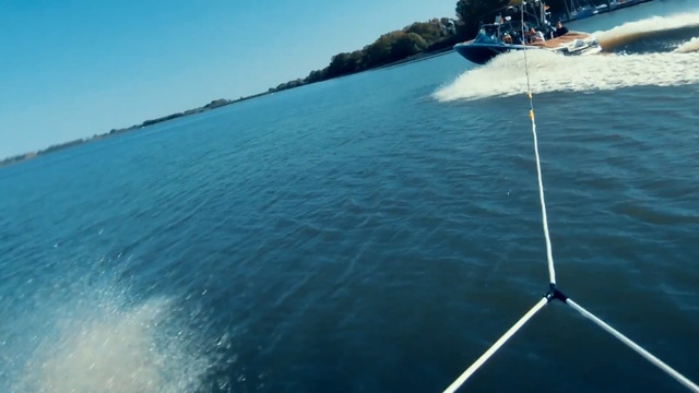 Video Reference: Surface water sports, Parasailing, Towed water sport, Sea, Water, Ocean, Water sport, Recreation, Kite sports, Sailing, Person