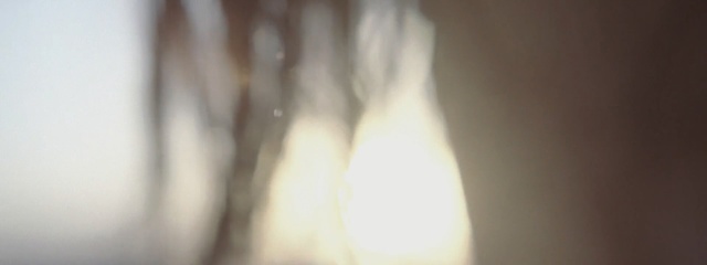 Video Reference: white, light, lighting, close up, lamp, light fixture, sunlight, hand, neck, flame