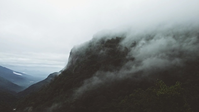 Video Reference: Mountainous landforms, Highland, Mountain, Ridge, Atmospheric phenomenon, Hill station, Mist, Mountain range, Sky, Fog
