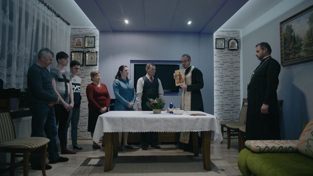 Video Reference: Event, Room, Design, Table, Interior design, Adaptation, Furniture, House, Person, Indoor, Ceiling, Man, People, Woman, Front, Sitting, Standing, Living, Group, Large, Bench, White, Floor, Clothing