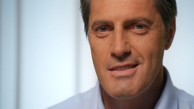 Video Reference: person, chin, forehead, cheek, close up, white collar worker, businessperson, jaw, smile