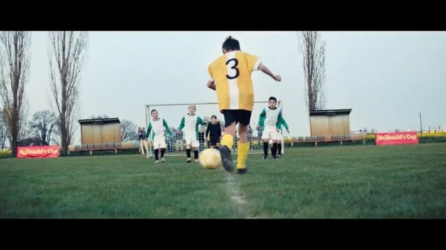 Video Reference: player, football player, ball, grass, yellow, games, football, vertebrate, ball, sports equipment, Person
