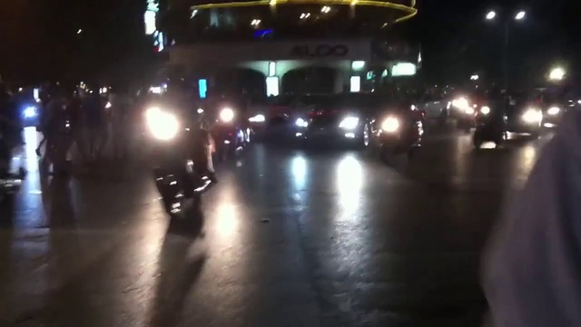 Video Reference: Night, Light, Darkness, Street light, Lighting, Metropolitan area, Midnight, Snapshot, Mode of transport, Reflection