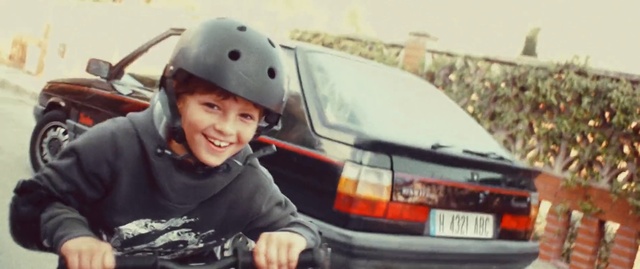 Video Reference: Vehicle, Motor vehicle, Car, Mode of transport, Vehicle door, Headgear, Automotive window part, Windshield, Smile