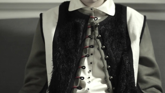Video Reference: formal wear, suit, fashion, outerwear, tuxedo, necktie, gentleman, product, collar, pattern