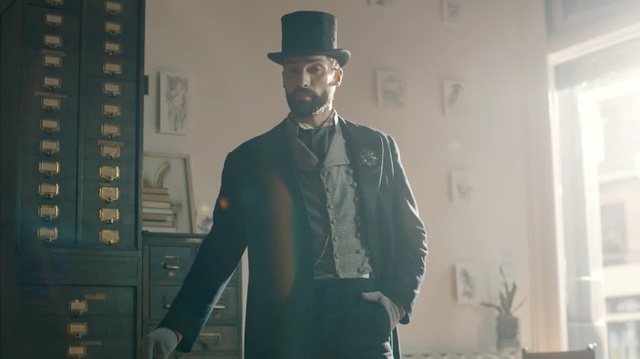 Video Reference: Gentleman, Standing, Male, Suit, Fashion, Headgear, Formal wear, Outerwear, Hat, Fedora, Person