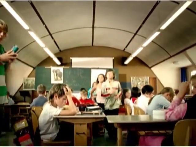 Video Reference: room, education, classroom, community, crowd, class, fun, audience, learning, student, Person