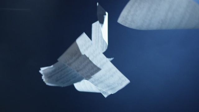 Video Reference: paper, falling, dark background, notes, fall