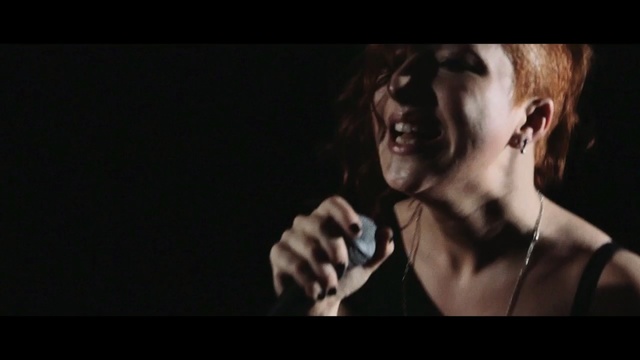 Video Reference: darkness, performance, song, singer, audio, singing, human, microphone, pop music, screenshot