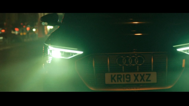 Video Reference: Land vehicle, Car, Automotive design, Vehicle, Automotive lighting, Light, Headlamp, Green, Mode of transport, Vehicle registration plate
