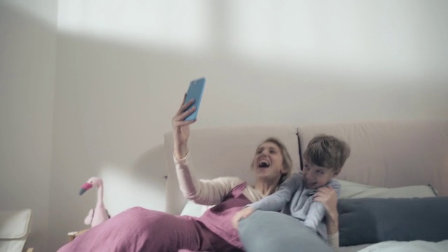 Video Reference: Room, Ceiling, Joint, Technology, Electronic device, Leg, Hand, Bed, Furniture, Photography