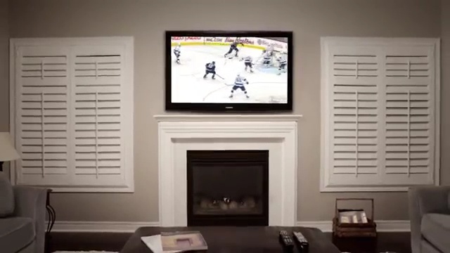 Video Reference: room, interior design, wall, living room, home, window, window covering, multimedia, flat panel display, display device