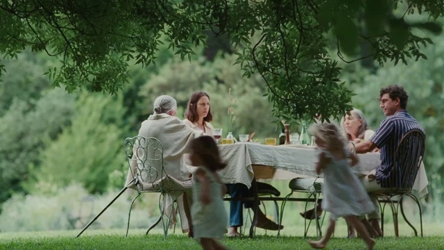 Video Reference: Furniture, Table, Chair, Leg, Plant, Dress, Mammal, Outdoor table, Happy, People in nature