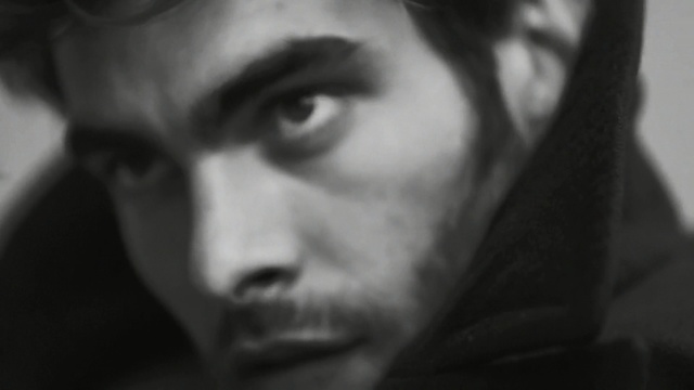 Video Reference: Face, Black, White, Nose, Photograph, Eyebrow, Black-and-white, Head, Monochrome photography, Monochrome, Indoor, Person, Looking, Hair, Wearing, Camera, Close, Glasses, Staring, Photo, Woman, Man, Young, Shirt, Holding, Brushing, Teeth, Mirror, Suit, Eyes, Girl, Red, Mouth, Room, Sunglasses, Hat, Standing, Human face, Portrait, Black and white, Forehead, Blur, Spectacles