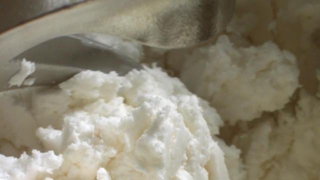 Video Reference: instant mashed potatoes, rice, dish, dairy product, glutinous rice, white rice, food, commodity, Person