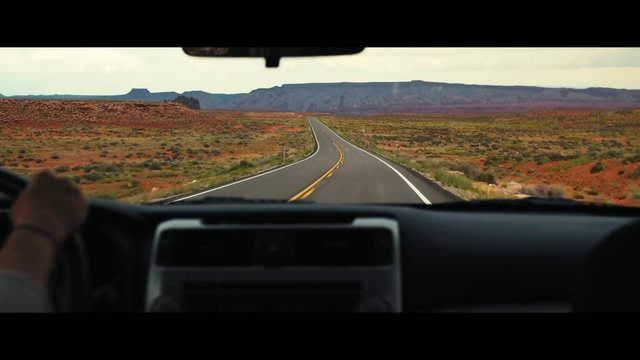 Video Reference: Road trip, Road, Sky, Mode of transport, Windshield, Natural environment, Automotive exterior, Windscreen wiper, Automotive mirror, Vehicle