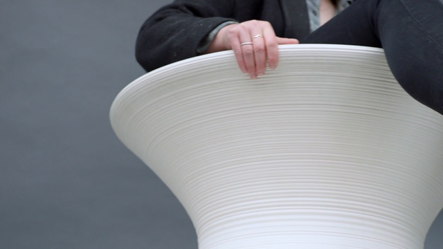 Video Reference: White, Architecture, Hand, Material property, Leg, Automotive wheel system, Wheel, Auto part, Beige, Ceiling