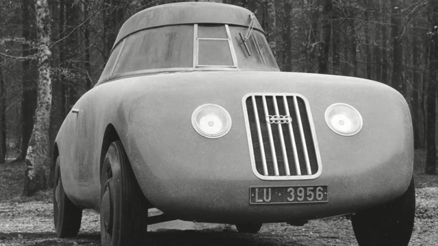 Video Reference: car, motor vehicle, vehicle, black and white, automotive design, monochrome photography, classic, monochrome, classic car, mid size car