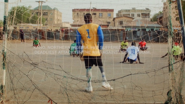 Video Reference: sports, net, team sport, sport venue, recreation, leisure, competition event, player, street football, team, Person