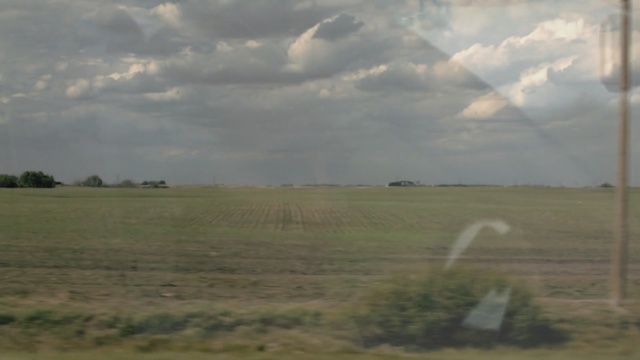 Video Reference: grassland, sky, field, cloud, plain, ecosystem, pasture, prairie, rural area, steppe