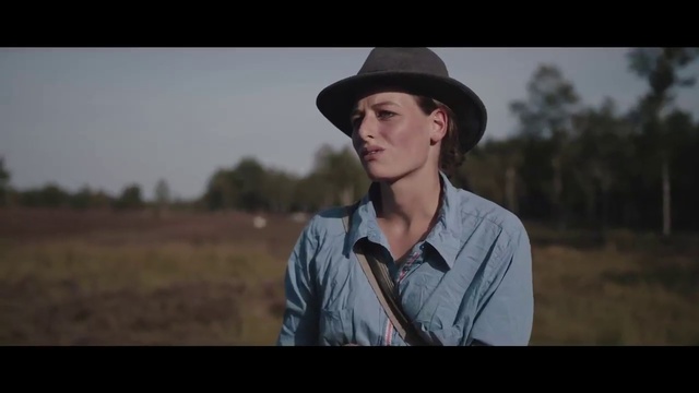 Video Reference: Cowboy hat, Hat, Headgear, Human, Photography, Landscape, Grass, Fedora, Fashion accessory, Portrait