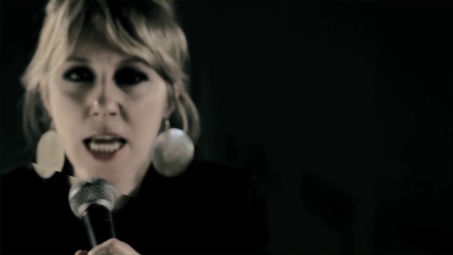 Video Reference: singing, singer, microphone, emotion, darkness, music artist, black and white, performance, pop music, audio, Person