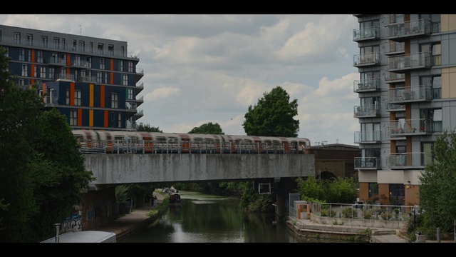 Video Reference: Bridge, Waterway, Architecture, Metropolitan area, Canal, Town, Water, Urban area, River, Building, Person