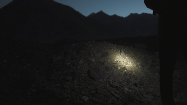 Video Reference: Black, Sky, Darkness, Light, Atmosphere, Atmospheric phenomenon, Night, Mountain, Geological phenomenon, Rock