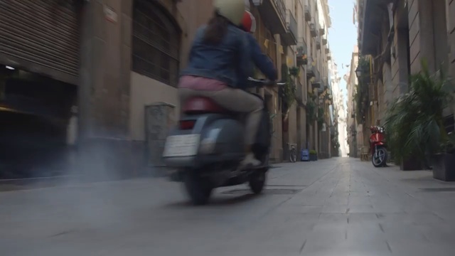 Video Reference: scooter, segway, street, mode of transport, transport, snapshot, asphalt, vehicle, vespa, pedestrian
