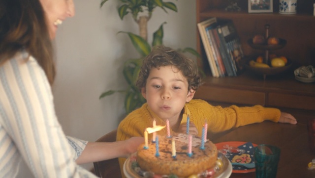 Video Reference: candle, meal, food, eating, eat, dinner, source of illumination, lunch, child, Person