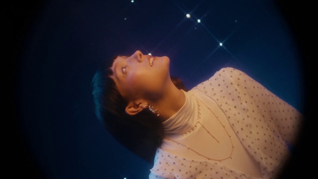 Video Reference: Sky, Nose, Human, Performance, Neck, Mouth, Photography, Space, Singer, Cloud