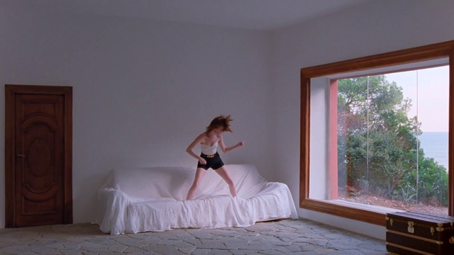 Video Reference: Room, Bedroom, Pink, Bed, Leg, Furniture, Floor, Bed sheet, Dress, Hardwood