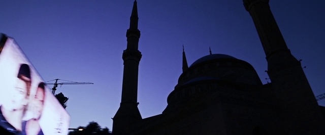 Video Reference: Sky, Mosque, Landmark, Place of worship, Spire, Steeple, Silhouette, Architecture, Building, Tower
