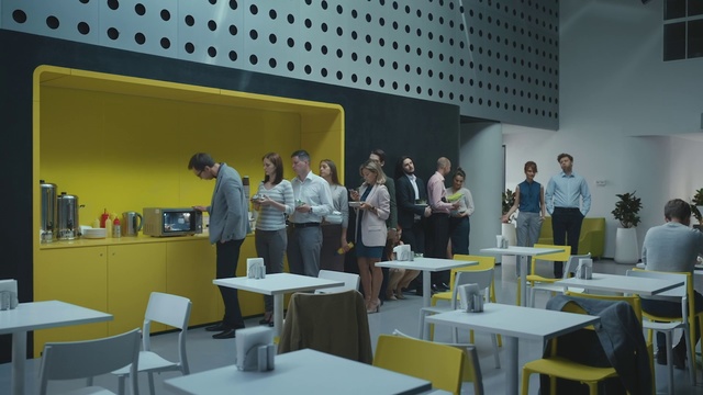 Video Reference: Yellow, Room, Architecture, Design, Restaurant, Interior design, Event, Building, Table, Cafeteria