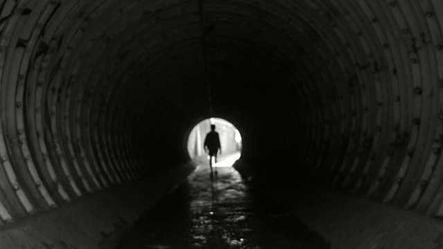 Video Reference: tunnel, black and white, monochrome photography, infrastructure, photography, darkness, monochrome, fixed link, sanitary sewer, symmetry, Person