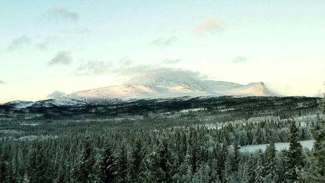 Video Reference: Mountainous landforms, Mountain, Highland, Nature, Sky, Winter, Snow, Wilderness, Hill, Atmospheric phenomenon