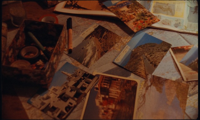 Video Reference: Art, Visual arts, Still life, Indoor, Table, Food, Pizza, Slice, Piece, Sitting, Laptop, Computer, Bread, Items, Plate, Eaten, Half, Covered, Cutting, Sandwich, Desk, Different, Eating, Cake, Keyboard, White, Cheese, Man, Board, Meal, Cluttered