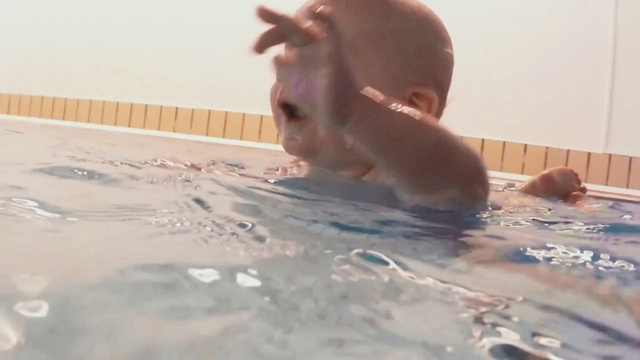 Video Reference: water, bathtub, bathing, swimming pool, fun, floor, leisure, recreation, toddler, vacation, Person