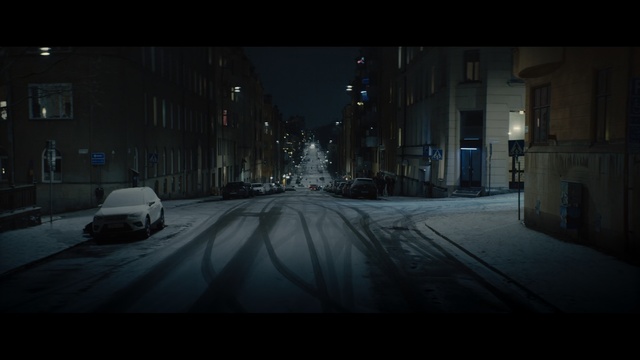 Video Reference: Black, Darkness, Snow, Urban area, Night, Street, Light, Mode of transport, Lane, Winter