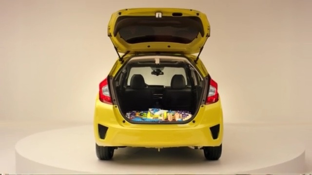 Video Reference: car, motor vehicle, vehicle, yellow, vehicle door, automotive design, mode of transport, city car, bumper, automotive exterior