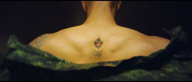 Video Reference: Tattoo, Neck, Shoulder, Joint, Back, Arm, Leaf, Human body, Muscle, Butterfly