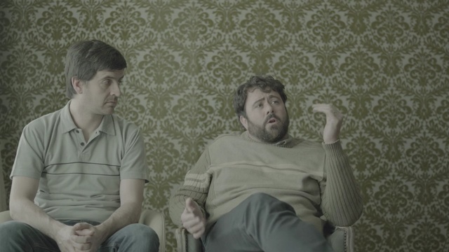 Video Reference: man, photograph, green, facial expression, person, sitting, male, wall, snapshot, emotion