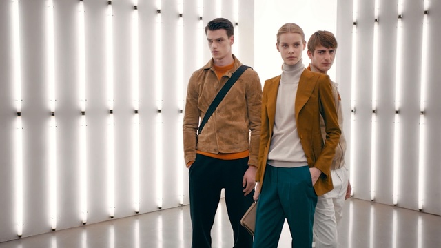 Video Reference: Fashion, Standing, Workwear, Fashion design, Outerwear, Gentleman, White-collar worker, Jacket, Sleeve, Dress shirt, Person